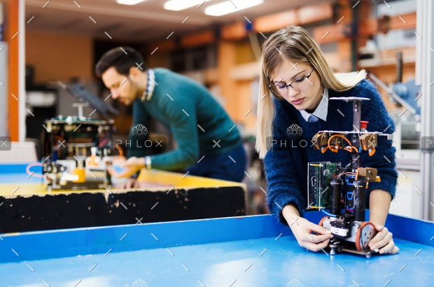 demo-attachment-116-young-student-of-robotics-working-on-project-S32GWUC